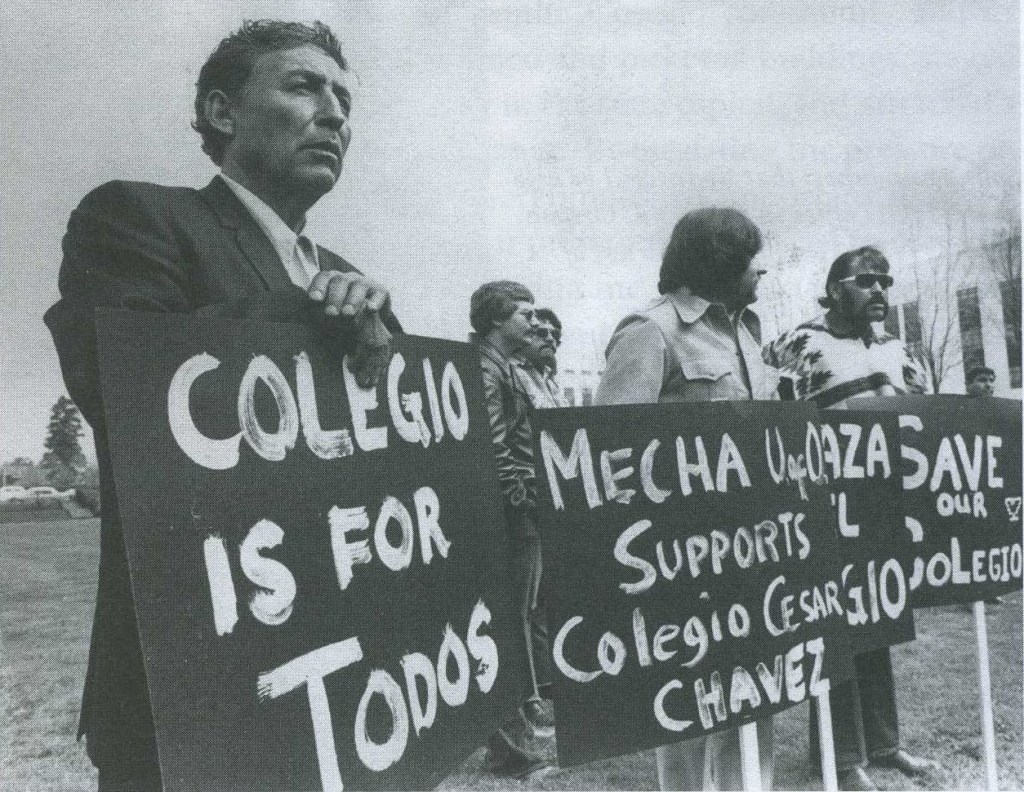 Image shows five protestors holding signs against the shut down of Cesar Chavez University